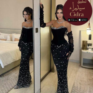 فستان سهرة مرصع بالزركون واللؤلؤ