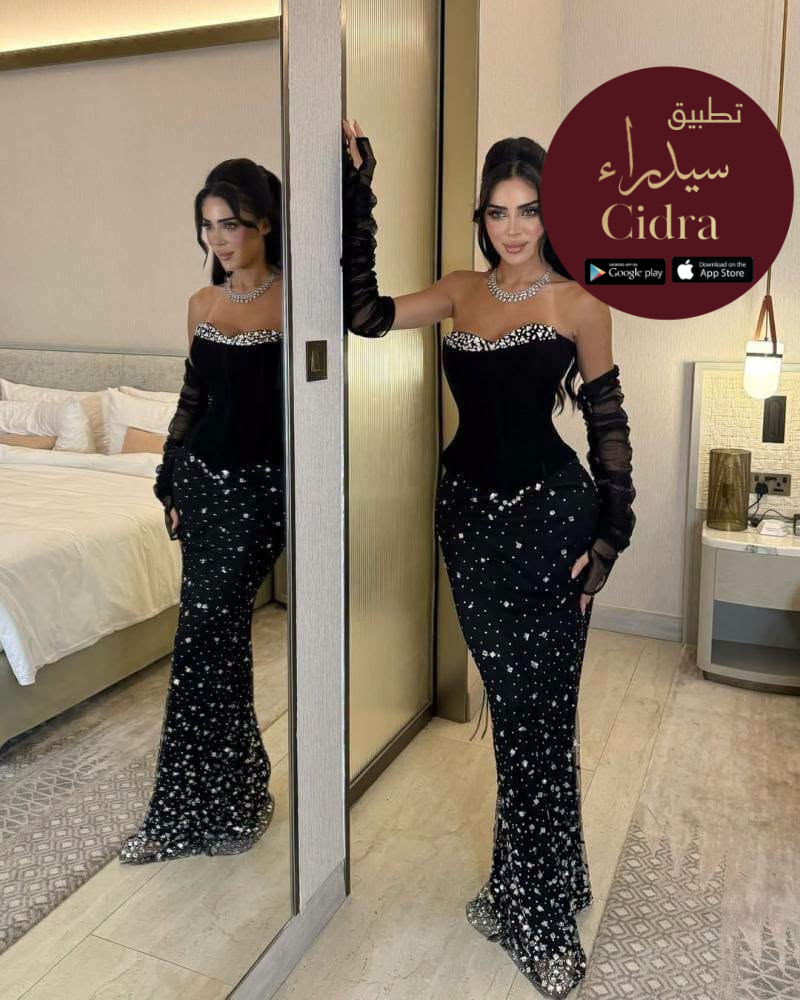 فستان سهرة مرصع بالزركون واللؤلؤ